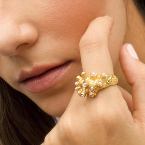gold rind with small white pearls for woman